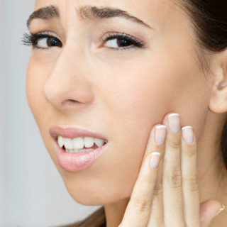 Moça com dor de dente - Foto: Getty Images