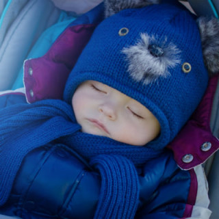 Bebê bem agasalhado - Foto: Getty Images