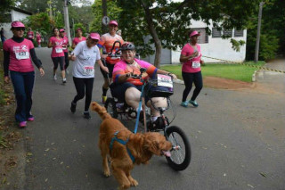 Danielle e seu fiel companheiro de corridas - Foto: Arquivo pessoal