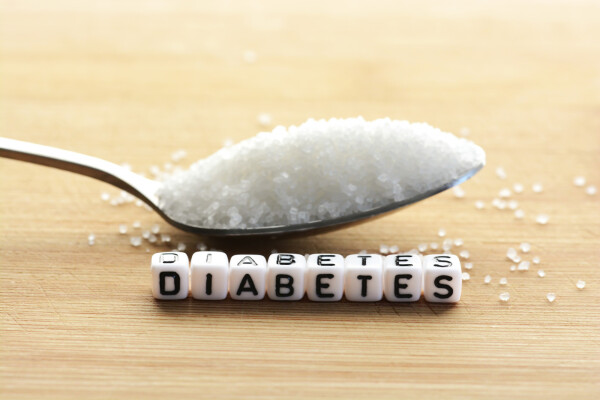 Colher com açúcar e diabetes