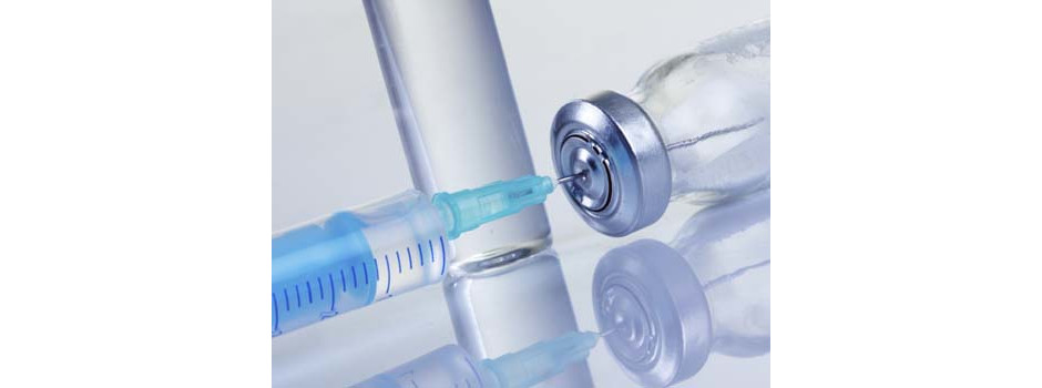 Vacina e seringa
